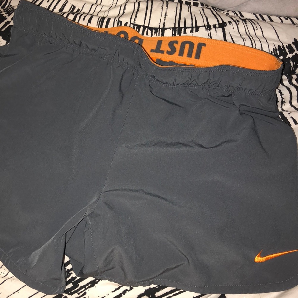 Grey and orange nike shorts
